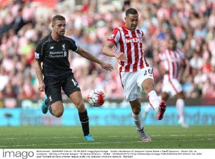 Jordan Henderson of Liverpool tracks Stoke s Geoff Cameron - Stoke City vs. Liverpool - Barclay s Premier League - Britannia Stadium - Stoke - 09 08 2015 Pic Philip Oldham Sportimage EDITORIAL USE ONLY. No use with unauthorised audio, video, data, fixture lists, club league logos or live services. Online in-match use limited to 120 images, no video emulation. No use in betting, games or single club league player publications.