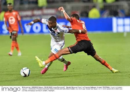 Claudio Beauvue (lyon) vs Francois Bellegou (lorient) FOOTBALL : Lyon vs Lorient - Ligue 1 - 09 08 2015 FredericChambert 
