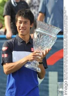 Aug. 9, 2015 - Washington, D.C, U.S - KEI NISHIKORI of Japan holds his trophy after winning the men s final of the Citi Open at the Rock Creek Tennis Center in Washington, D.C. Nishikori beat John Isner of the United States in 3 sets. Tennis 2015 - Citi Open - Day 7 - ZUMAg196