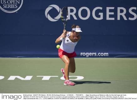 (150810) -- TORONTO, - Olga Govortsova of Belarus returns the ball against Julia Glushko of Israel during the second round of women s singles qualifying match at the 2015 Rogers Cup in Toronto, Canada, August 9, 2015. Olga Govortsova won 2-1. ) (SP)CANADA-TORONTO-TENNIS-ROGERS CUP-WOMEN S SINGLES-QUALIFYING ZouxZheng 