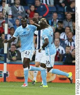 Yaya Toure of Manchester City (l) celebrates scoring the opening goal - English Premier League - WBA v Manchester City - The Hawthorns Stadium - West Bromwich - England - 10th August 2015 - Picture Simon Bellis Sportimage EDITORIAL USE ONLY. No use with unauthorised audio, video, data, fixture lists, club league logos or live services. Online in-match use limited to 120 images, no video emulation. No use in betting, games or single club league player publications.