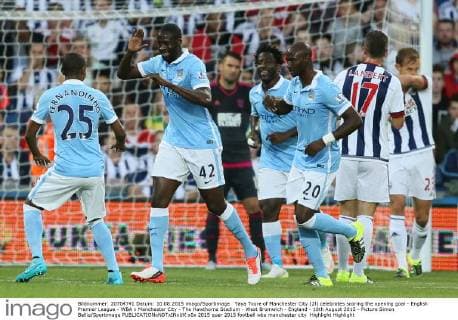 Yaya Toure of Manchester City (2l) celebrates scoring the opening goal - English Premier League - WBA v Manchester City - The Hawthorns Stadium - West Bromwich - England - 10th August 2015 - Picture Simon Bellis Sportimage EDITORIAL USE ONLY. No use with unauthorised audio, video, data, fixture lists, club league logos or live services. Online in-match use limited to 120 images, no video emulation. No use in betting, games or single club league player publications.