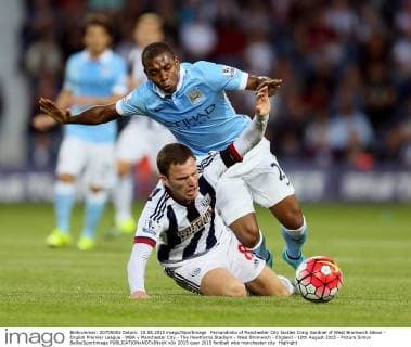 Fernandinho of Manchester City tackles Craig Gardner of West Bromwich Albion - English Premier League - WBA v Manchester City - The Hawthorns Stadium - West Bromwich - England - 10th August 2015 - Picture Simon Bellis Sportimage EDITORIAL USE ONLY. No use with unauthorised audio, video, data, fixture lists, club league logos or live services. Online in-match use limited to 120 images, no video emulation. No use in betting, games or single club league player publications.
