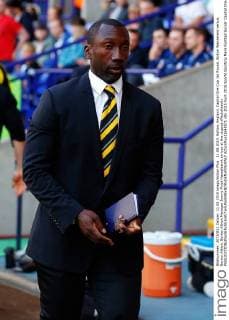 11.08.2015. Bolton, England. Capital One Cup 1st Round. Bolton Wanderers versus Burton Albion. Burton Albion Manager Jimmy Floyd Hasselbaink arrives at the dugout xPaulxKeevilx  ActionPlus11648571