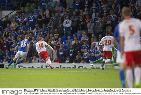 11.08.2015. Ipswich, England. Capital One Cup 1st Round. Ipswich Town versus Stevenage Borough. Stevenage s Dean Parrett shoots at goal which lead to an own goal by Ipswich Town s Christophe Berra to put Stevenage in front. xNigelxCookex  ActionPlus11648577