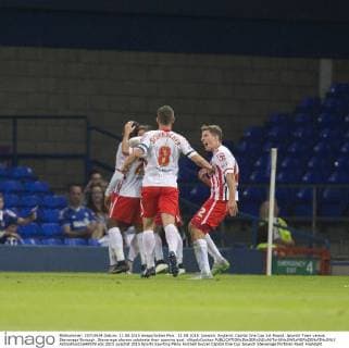 11.08.2015. Ipswich, England. Capital One Cup 1st Round. Ipswich Town versus Stevenage Borough. Stevenage players celebrate their opening goal. xNigelxCookex  ActionPlus11648579