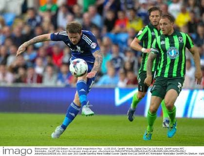 11.08.2015. Cardiff, Wales. Capital One Cup 1st Round. Cardiff versus AFC Wimbledon. Cardiff City s Aron Gunnarsson shoots at goal. xPaulxJenkinsx  ActionPlus11648595