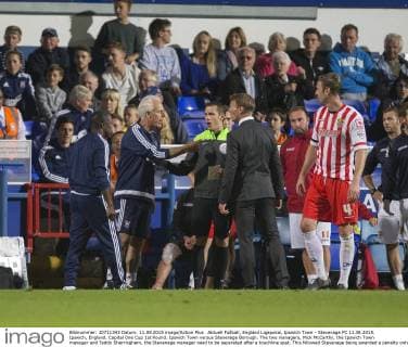 Aktuell FuÃŸball, England Ligapokal, Ipswich Town - Stevenage FC 11.08.2015. Ipswich, England. Capital One Cup 1st Round. Ipswich Town versus Stevenage Borough. The two managers, Mick McCarthy, the Ipswich Town manager and Teddy Sherringham, the Stevenage manager need to be separated after a touchline spat. This followed Stevenage being awarded a penalty only for it to be changed to a freekick. xNigelxCookex  ActionPlus11648618