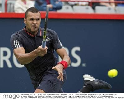 MONTREAL, Aug. 11, 2015 -- Jo-Wilfried Tsonga of France hits a return to Borna Coric of Croatia during the men s singles first round match at the 2015 Rogers Cup in Montreal, Canada, on Aug. 11, 2015. Jo-Wilfried Tsonga won 2-0. ) (SP)CANADA-MONTREAL-TENNIS-ROGERS CUP-MEN S SINGLES AndrewxSoong 