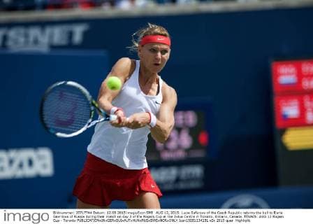 AUG 12, 2015: Lucie Safarova of the Czech Republic returns the ball to Daria Gavrilova of Russia during their match on day 3 of the Rogers Cup at the Aviva Centre in Toronto, Ontario, Canada. TENNIS: AUG 12 Rogers Cup - Toronto Icon15081234131 EDITORIAL USE ONLY