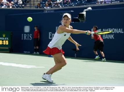 AUG 12, 2015: Daria Gavrilova of Russia returns the ball to Lucie Safarova of the Czech Republic during their match on day 3 of the Rogers Cup at the Aviva Centre in Toronto, Ontario, Canada. TENNIS: AUG 12 Rogers Cup - Toronto Icon15081248931 EDITORIAL USE ONLY