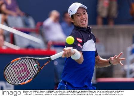 AUG 12, 2015 : Kei Nishikori of Japan hits the ball during his match against Pablo Andujar of Spain in the second round of the Rogers Cup presented by National Bank at the Uniprix Stadium in Montreal, Quebec, Canada. TENNIS: AUG 12 Rogers Cup - Montreal Icon15081217 EDITORIAL USE ONLY