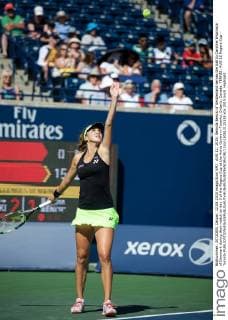 AUG 12, 2015: Belinda Bencic of Switzerland serves the ball to Caroline Wozniacki of Denmark during their match on day 3 of the Rogers Cup at the Aviva Centre in Toronto, Ontario, Canada. TENNIS: AUG 12 Rogers Cup - Toronto Icon150812125133 EDITORIAL USE ONLY