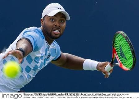 AUG 12, 2015 : Donald Young of the United States eyes the ball during his match against Tomas Berdych of Czech Republic in the second round of the Rogers Cup presented by National Bank at the Uniprix Stadium in Montreal, Quebec, Canada. TENNIS: AUG 12 Rogers Cup - Montreal Icon15081246 EDITORIAL USE ONLY