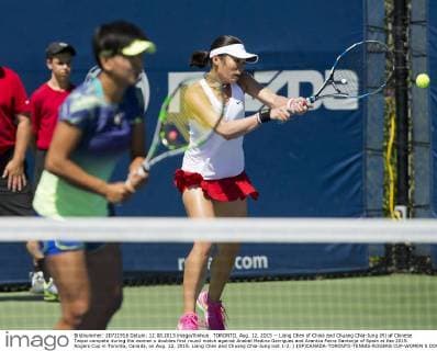TORONTO, Aug. 12, 2015 -- Liang Chen of China and Chuang Chia-Jung (R) of Chinese Taipei compete during the women s doubles first round match against Anabel Medina Garrigues and Arantxa Parra Santonja of Spain at the 2015 Rogers Cup in Toronto, Canada, on Aug. 12, 2015. Liang Chen and Chuang Chia-Jung lost 1-2. ) (SP)CANADA-TORONTO-TENNIS-ROGERS CUP-WOMEN S DOUBLES ZouxZheng 