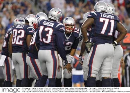 New England Patriots quarterback Tom Brady (12) leads the huddle in the first quarter of the preseason game against the Green Bay Packers at Gillette Stadium in Foxborough, Massachusetts on August 13, 2015.  BOS2015081315 MATTHEWxHEALEY