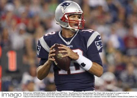New England Patriots quarterback Tom Brady (12) drops back for a pass in the first quarter of the preseason game against the Green Bay Packers at Gillette Stadium in Foxborough, Massachusetts on August 13, 2015.  BOS2015081316 MATTHEWxHEALEY