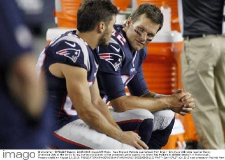 New England Patriots quarterback Tom Brady (12) chats with wide receiver Danny Amendola (80) on the bench during the second quarter of the preseason game against the Green Bay Packers at Gillette Stadium in Foxborough, Massachusetts on August 13, 2015.  BOS2015081323 MATTHEWxHEALEY