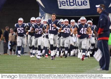 August 13, 2015: New England Patriots quarterback Tom Brady (12) leads the Patriots onto the field at an NFL American Football Herren USA pre-season game between the Green Bay Packers and the New England Patriots held at Gillette Stadium in Foxborough Massachusetts. The Packers defeated the Patriots 22-11 in regulation time. NFL 2015: Packers vs Patriots AUG 13 - ZUMAc04_