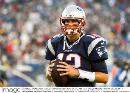 August 13, 2015: New England Patriots quarterback Tom Brady (12) gets ready to take the field for the Patriots opening drive at an NFL American Football Herren USA pre-season game between the Green Bay Packers and the New England Patriots held at Gillette Stadium in Foxborough Massachusetts. The Packers defeated the Patriots 22-11 in regulation time. NFL 2015: Packers vs Patriots AUG 13 - ZUMAc04_