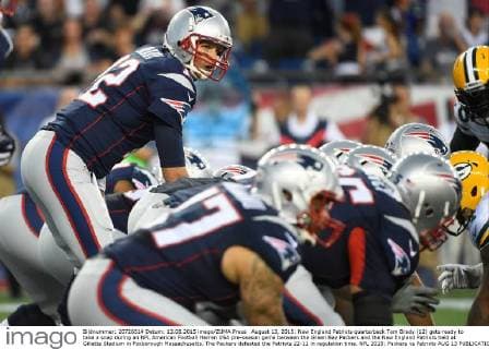 August 13, 2015: New England Patriots quarterback Tom Brady (12) gets ready to take a snap during an NFL American Football Herren USA pre-season game between the Green Bay Packers and the New England Patriots held at Gillette Stadium in Foxborough Massachusetts. The Packers defeated the Patriots 22-11 in regulation time. NFL 2015: Packers vs Patriots AUG 13 - ZUMAc04_
