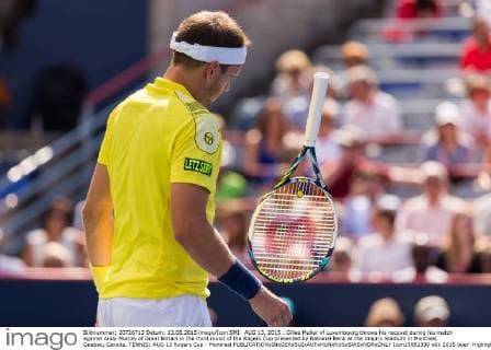 AUG 13, 2015 : Gilles Muller of Luxembourg throws his racquet during his match against Andy Murray of Great Britain in the third round of the Rogers Cup presented by National Bank at the Uniprix Stadium in Montreal, Quebec, Canada. TENNIS: AUG 13 Rogers Cup - Montreal Icon15081330 EDITORIAL USE ONLY