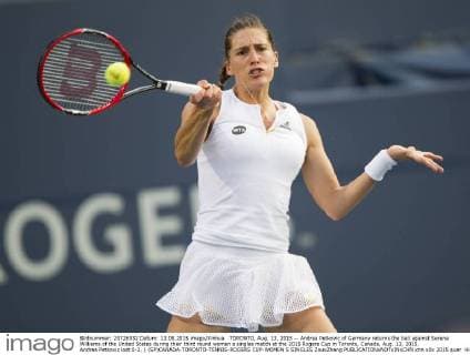 TORONTO, Aug. 13, 2015 -- Andrea Petkovic of Germany returns the ball against Serena Williams of the United States during their third round women s singles match at the 2015 Rogers Cup in Toronto, Canada, Aug. 13, 2015. Andrea Petkovic lost 0-2. ) (SP)CANADA-TORONTO-TENNIS-ROGERS CUP-WOMEN S SINGLES ZouxZheng 