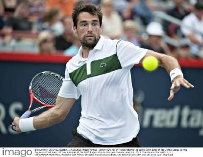 Jeremy Chardy of France returns the ball to John Isner of the United States during the quarterfinal match of men s singles at the 2015 Rogers Cup in Montreal, Canada, Aug. 14, 2015. Chardy won the match 2-1. ) (SP)CANADA-MONTREAL-ROGERS CUP-MEN S SINGLES AndrewxSoong 