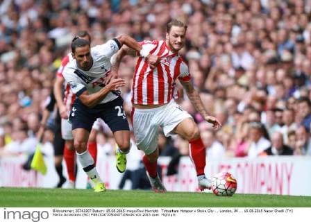 Tottenham Hotspur v Stoke City . . London, UK . . 15.08.2015 Nacer Chadli (TH) Marko Arnautovic (SC) 