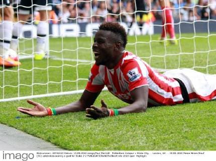 Tottenham Hotspur v Stoke City . . London, UK . . 15.08.2015 Mame Biram Diouf (SC) celebrates scoring a goal for Stoke 2-2 