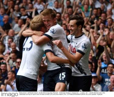 Tottenham Hotspur v Stoke City . . London, UK . . 15.08.2015 Eric Dier (TH) celebrates scoring for Spurs with Christian Eriksen (TH) and Ryan Mason (TH). 1-0 