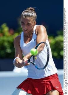 AUG 15, 2015: Sara Errani of Italy returns the ball to Simona Halep of Romania during their semi-final match of the Rogers Cup tournament at the Aviva Centre in Toronto, Ontario, Canada. TENNIS: AUG 15 Rogers Cup - Toronto Icon15081501101 EDITORIAL USE ONLY