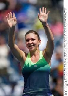 AUG 15, 2015: Simona Halep of Romania celebrates her win against Sara Errani of Italy after their semi-final match of the Rogers Cup tournament at the Aviva Centre in Toronto, Ontario, Canada. TENNIS: AUG 15 Rogers Cup - Toronto Icon15081505071 EDITORIAL USE ONLY