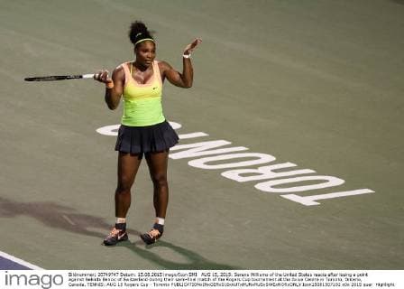 AUG 15, 2015: Serena Williams of the United States reacts after losing a point against Belinda Bencic of Switzerland during their semi-final match of the Rogers Cup tournament at the Aviva Centre in Toronto, Ontario, Canada. TENNIS: AUG 15 Rogers Cup - Toronto Icon15081507102 EDITORIAL USE ONLY