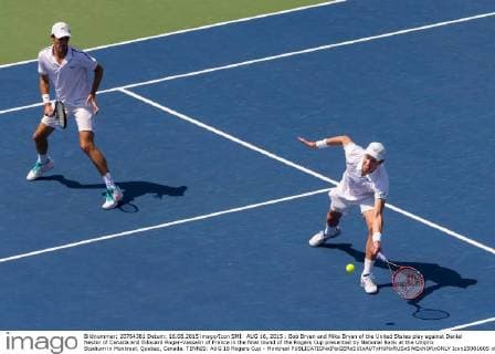 AUG 16, 2015 : Bob Bryan and Mike Bryan of the United States play against Daniel Nestor of Canada and Edouard Roger-Vasselin of France in the final round of the Rogers Cup presented by National Bank at the Uniprix Stadium in Montreal, Quebec, Canada. TENNIS: AUG 16 Rogers Cup - Montreal Icon15081605 EDITORIAL USE ONLY