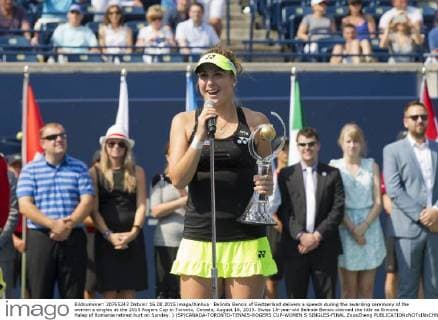Belinda Bencic of Switzerland delivers a speech during the awarding ceremony of the women s singles at the 2015 Rogers Cup in Toronto, Canada, August 16, 2015. Swiss 18-year-old Belinda Bencic claimed the title as Simona Halep of Romania retired hurt on Sunday. ) (SP)CANADA-TORONTO-TENNIS-ROGERS CUP-WOMEN S SINGLES-FINAL ZouxZheng 
