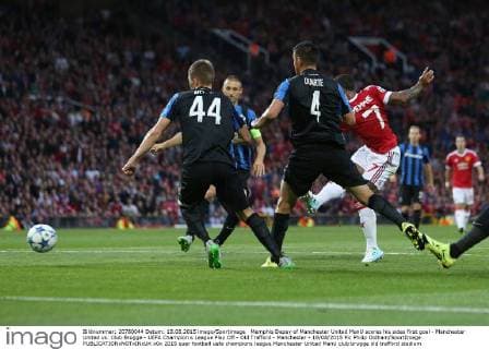 Memphis Depay of Manchester United ManU scores his sides first goal - Manchester United vs. Club Brugge - UEFA Champion s League Play Off - Old Trafford - Manchester - 18 08 2015 Pic Philip Oldham SportImage EDITORIAL USE ONLY. No use with unauthorised audio, video, data, fixture lists, club league logos or live services. Online in-match use limited to 120 images, no video emulation. No use in betting, games or single club league player publications.