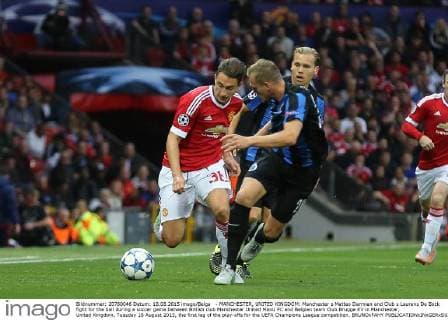 - MANCHESTER, UNITED KINGDOM: Manchester s Matteo Darmian and Club s Laurens De Bock fight for the ball during a soccer game between British club Manchester United ManU FC and Belgian team Club Brugge KV in Manchester, United Kingdom, Tuesday 18 August 2015, the first leg of the play-offs for the UEFA Champions League competition. BRUNOxFAHY  x04682697x