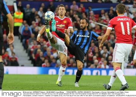- MANCHESTER, UNITED KINGDOM: Manchester s Morgan Schneiderlin and Club s Victor Vazquez Solsona fight for the ball during a soccer game between British club Manchester United ManU FC and Belgian team Club Brugge KV in Manchester, United Kingdom, Tuesday 18 August 2015, the first leg of the play-offs for the UEFA Champions League competition. BRUNOxFAHY  x04682698x