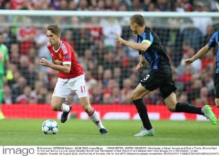 - MANCHESTER, UNITED KINGDOM: Manchester s Adnan Januzaj and Club s Timmy Simons fight for the ball during a soccer game between British club Manchester United ManU FC and Belgian team Club Brugge KV in Manchester, United Kingdom, Tuesday 18 August 2015, the first leg of the play-offs for the UEFA Champions League competition. BRUNOxFAHY  x04682699x