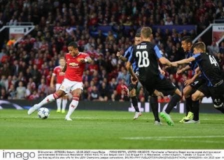 - MANCHESTER, UNITED KINGDOM: Manchester s Memphis Depay scores a goal during a soccer game between British club Manchester United ManU FC and Belgian team Club Brugge KV in Manchester, United Kingdom, Tuesday 18 August 2015, the first leg of the play-offs for the UEFA Champions League competition. BRUNOxFAHY  x04682696x