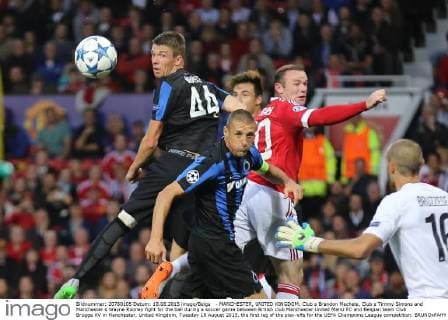 - MANCHESTER, UNITED KINGDOM: Club s Brandon Mechele, Club s Timmy Simons and Manchester s Wayne Rooney fight for the ball during a soccer game between British club Manchester United ManU FC and Belgian team Club Brugge KV in Manchester, United Kingdom, Tuesday 18 August 2015, the first leg of the play-offs for the UEFA Champions League competition. BRUNOxFAHY  x04682703x