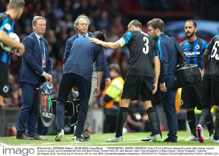 - MANCHESTER, UNITED KINGDOM: Club s Timmy Simons leaves the pitch after being injured during a soccer game between British club Manchester United ManU FC and Belgian team Club Brugge KV in Manchester, United Kingdom, Tuesday 18 August 2015, the first leg of the play-offs for the UEFA Champions League competition. BRUNOxFAHY  x04682723x