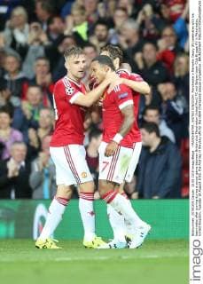 - MANCHESTER, UNITED KINGDOM: Manchester s Memphis Depay (R) celebrates with his teammates after scoring during a soccer game between British club Manchester United ManU FC and Belgian team Club Brugge KV in Manchester, United Kingdom, Tuesday 18 August 2015, the first leg of the play-offs for the UEFA Champions League competition. BRUNOxFAHY  x04682725x