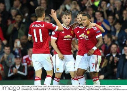 - MANCHESTER, UNITED KINGDOM: Manchester s Memphis Depay (R) celebrates with his teammates after scoring during a soccer game between British club Manchester United ManU FC and Belgian team Club Brugge KV in Manchester, United Kingdom, Tuesday 18 August 2015, the first leg of the play-offs for the UEFA Champions League competition. BRUNOxFAHY  x04682726x