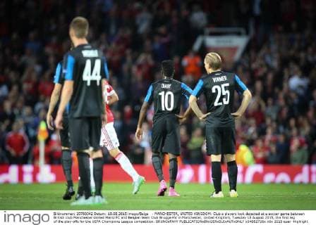 - MANCHESTER, UNITED KINGDOM: Club s players look dejected at a soccer game between British club Manchester United ManU FC and Belgian team Club Brugge KV in Manchester, United Kingdom, Tuesday 18 August 2015, the first leg of the play-offs for the UEFA Champions League competition. BRUNOxFAHY  x04682728x
