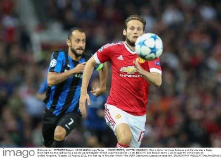 - MANCHESTER, UNITED KINGDOM: Club s Victor Vazquez Solsona and Manchester s Daley Blind fight for the ball during a soccer game between British club Manchester United ManU FC and Belgian team Club Brugge KV in Manchester, United Kingdom, Tuesday 18 August 2015, the first leg of the play-offs for the UEFA Champions League competition. BRUNOxFAHY  x04682738x