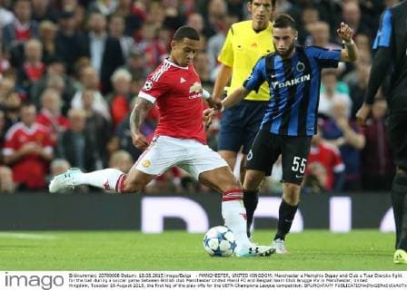 - MANCHESTER, UNITED KINGDOM: Manchester s Memphis Depay and Club s Tuur Dierckx fight for the ball during a soccer game between British club Manchester United ManU FC and Belgian team Club Brugge KV in Manchester, United Kingdom, Tuesday 18 August 2015, the first leg of the play-offs for the UEFA Champions League competition. BRUNOxFAHY  x04682743x