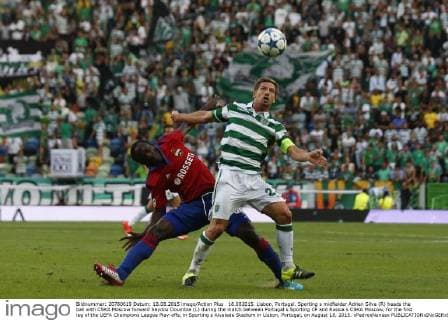18.082015. Lisbon, Portugal. Sporting s midfielder Adrien Silva (R) heads the ball with CSKA Moscow forward Seydou Doumbia (L) during the match between Portugal s Sporting CP and Russia s CSKA Moscow, for the first leg of the UEFA Champions League Play-offs, in Sporting s Alvalade Stadium in Lisbon, Portugal, on August 18, 2015. xPedroxNunesx  ActionPlus11650788