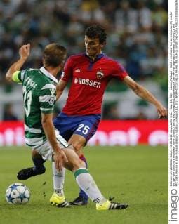 Aug. 18, 2015 - Lisbon, Portugal - CSKA s midfielder Roman Eremenko (R) vies for the ball with Sporting s midfielder Adrien Silva (L) during the Champions League football play-off first leg match between Sporting CP and PFC CSKA Moscow at Jose Alvalade Stadium in Lisbon on August 18, 2015. NURPHOTO CARLOS PALMA. FBL-EUR-C1-SPORTING-CSKA  - ZUMAn230
